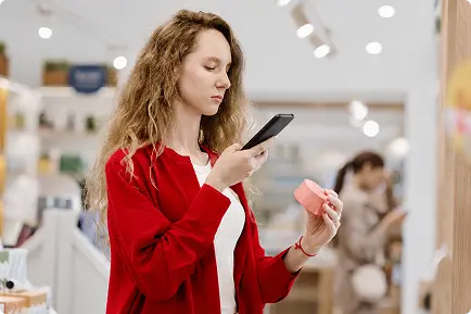 Shopper checking a product's Digital Product Passport on her phone in store